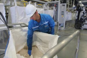 Saltworks’ operator showing zero-liquid-discharge (ZLD) salts collected from the AirBreather evaporator-crystallizer.