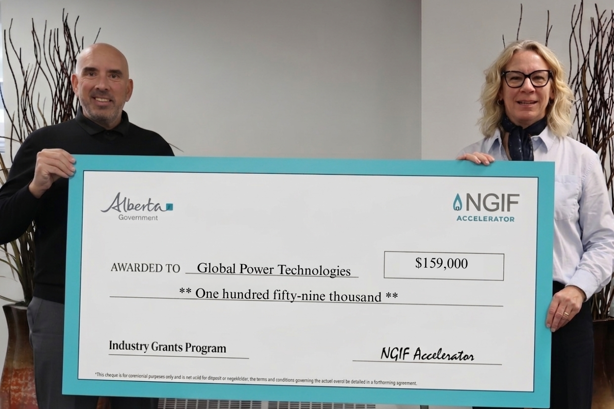 John Adams of NGIF Accelerator and Laura Kennedy of Global Power Technologies are holding a cheque.